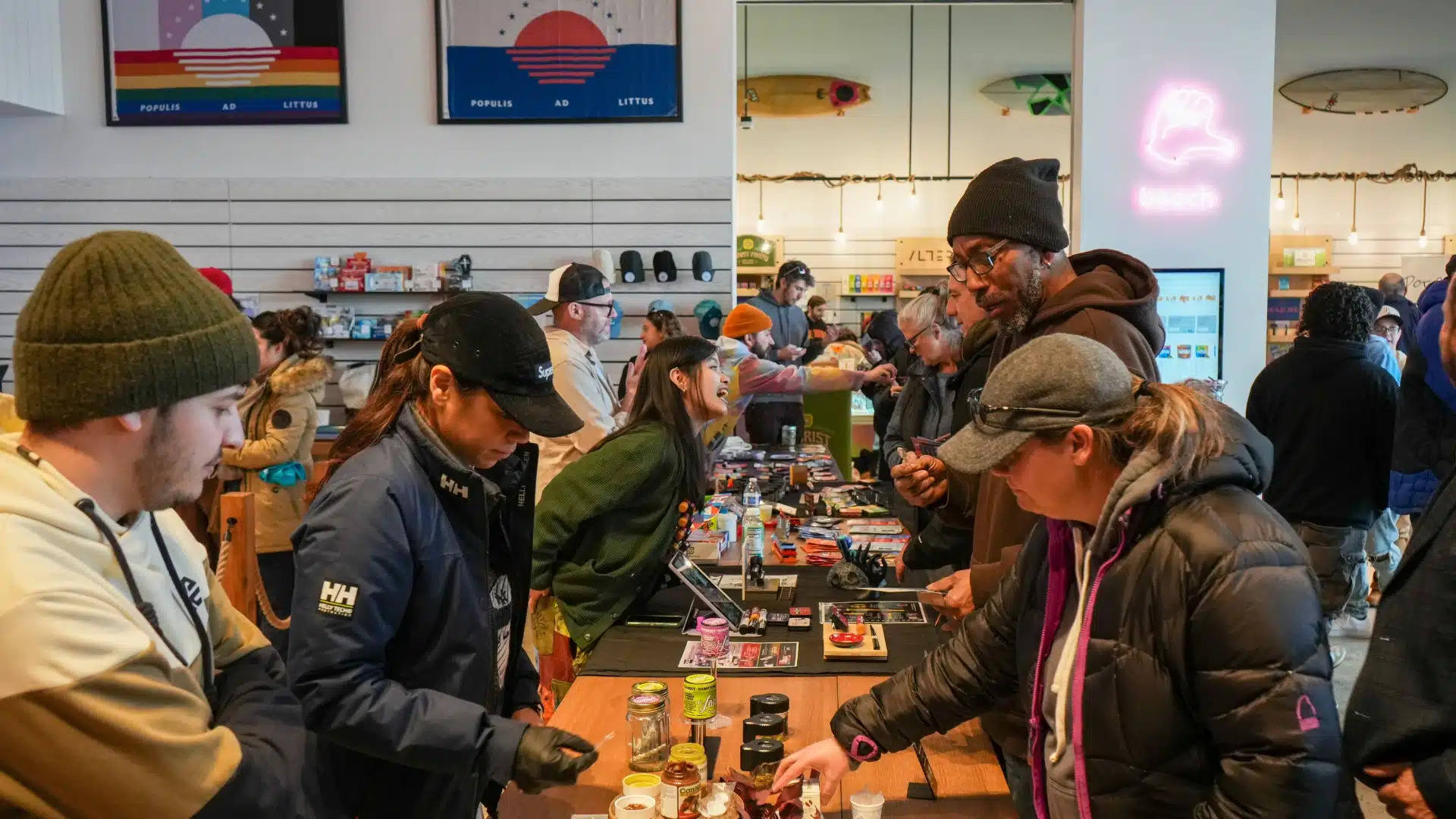 Customers and staff at a community event inside Seaweed dispensary in Rockaway Beach